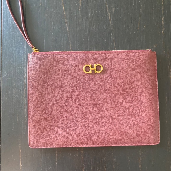 Ferragamo Gancini logo-embossed Clutch Bag | Black | FARFETCH Salvatore Ferragamo Gancini Clutch Bag in Grained Leather